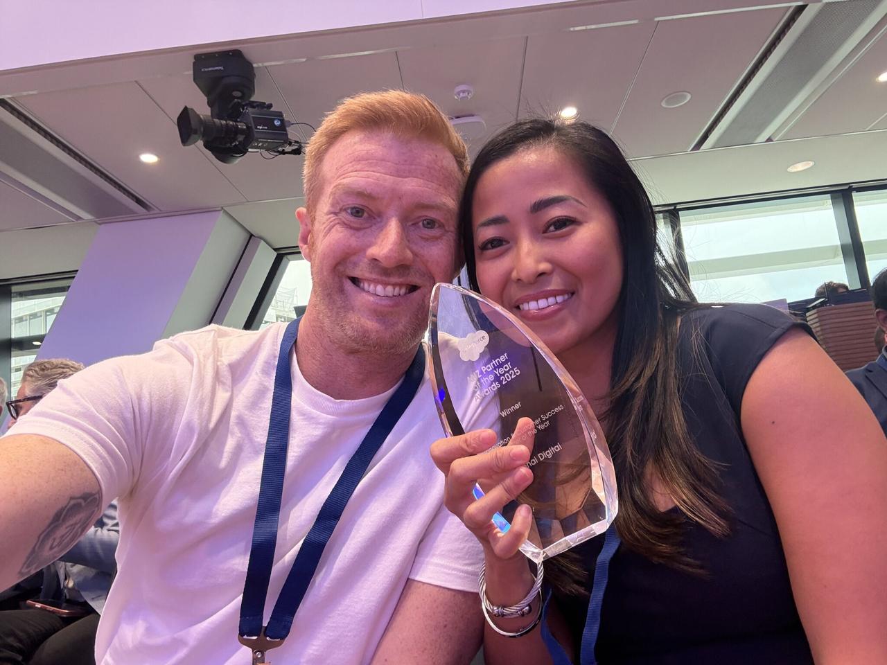 Robin Leonard with Salesforce Partner of the Year trophy