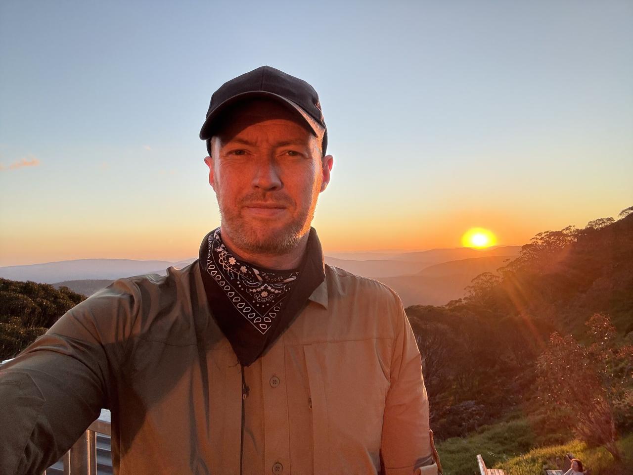 Robin Leonard during mountain expedition at golden hour